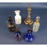 Six 19th century toilet water bottles, three in blue glass with additional gilded detail, two