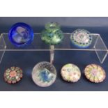 A collection of Scottish glass paperweights including three Perthshire Millefiori examples, one with