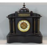 19th century black slate architectural mantle clock with two train movement and four pillar case,