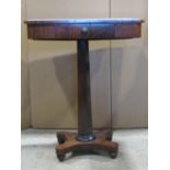 A mid 19th century rosewood side table, rectangular, enclosing a single frieze drawer raised on