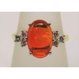 18ct oval fire opal and diamond ring, size O, 4.9g
