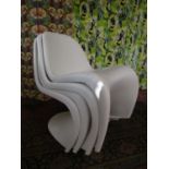 In the manner of Werner Panton - set of four white stacking chairs