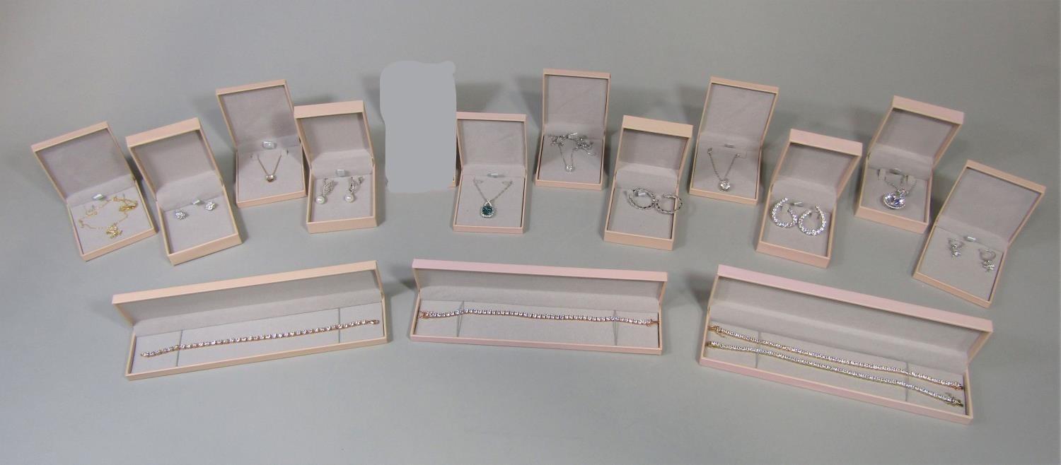 Collection of cased Diamonique silver and cubic zirconia jewellery to include four tennis bracelets