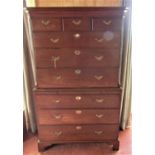 A good quality and small Georgian mahogany chest on chest, the lower section fitted with three