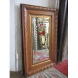 A pair of Edwardian mirror pictures, with bevelled edge plates within stepped and moulded oak frames
