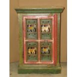An Indian hardwood cabinet with traditional painted detail, the front elevation enclosed by a