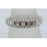 18ct white gold half hoop diamond ring set with round and princess cut stones, maker S M, size N,