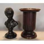 Cast bronze bust of a boy upon a stepped circular green veined marble plinth base, 21cm high,