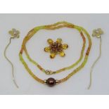 Pair of 9ct flowers together with a 9ct citrine pendant of floral form and a yellow / orange gem