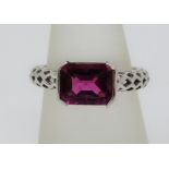 Pink tourmaline ring with pierced shank, unmarked, tests as 18ct white gold, size N, 5.7g