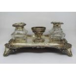 A Victorian silver stand dish of rectangular form, with raised and shaped C scroll and floral