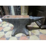 A vintage cast iron anvil, 68cm long x 27cm wide x 32cm high (on view in porchway)