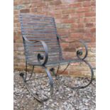 A sprung steel garden rocking chair with strap work seat and combined back, 60 cm wide