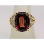 18ct garnet and diamond cocktail ring, maker T T, size N, 9.6g