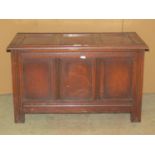 A small oak coffer in and old English style with a well fitted zinc liner (for use with coal or