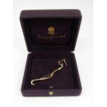 18ct Asprey big cat brooch set with a single diamond, 8cm long approx, 12.3g, with Asprey &