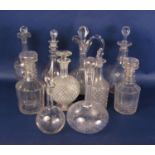 A collection of nine various 19th century and later glass decanters and stoppers including hobnail