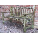 A weathered Lister teak three seat garden bench with slatted seat, back and broad arms, 160 cm