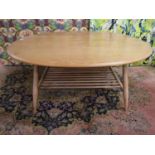 Ercol light elm circular coffee table with spindled under-tier, 44cm high x 100cm long