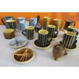 A collection of studio pottery by John Buccanan or Arch Pottery Cornwall comprising various mugs and
