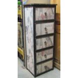 A contemporary but decorative pedestal chest of five long drawers covered in printed fabric with