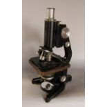 A Watson Barnet microscope, model number Service II, number 124081, in black enamel and chrome
