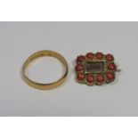 22ct wedding ring, size Q/R, 2.9g and a Victorian yellow metal coral mourning brooch (2)