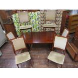 Spottrup Danish rosewood extending dining table and six chairs, the table with two extra leaves,