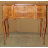 A reprodution Louis XV style dressing table with inlaid floral detail
