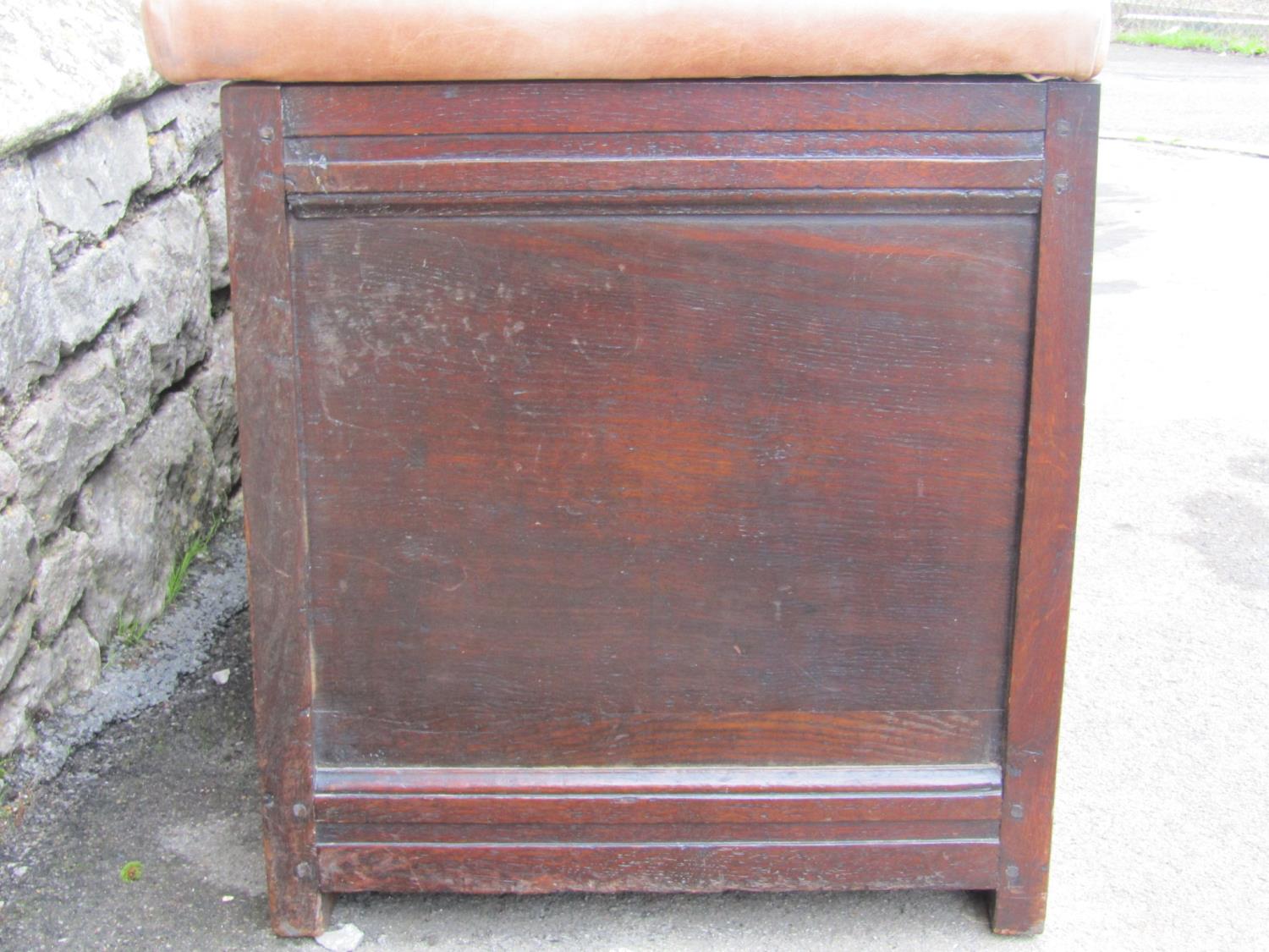 An 18th century oak coffer with panelled frame, moulded styles and carved foliate detail beneath a - Image 4 of 4