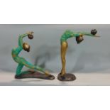 A pair of cast metal figures in the art deco style showing female gymnasts, 40cm high approx