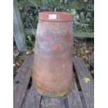 A weathered terracotta conical shaped rhubarb forcer with incised banded detail