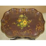 A Victorian Jennens & Bettridge London, papier mache tray with serpentine outline and floral detail,