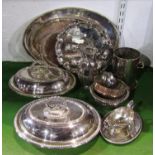 A collection of silver plated wares including a pair of entrée dishes and covers, three oval gallery