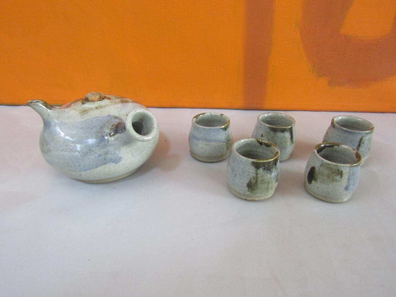 St Ives Pottery Saki/rice wine tea service comprising stylised ovoid tea pot and six celadon