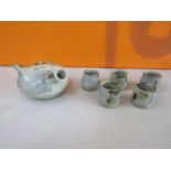 St Ives Pottery Saki/rice wine tea service comprising stylised ovoid tea pot and six celadon