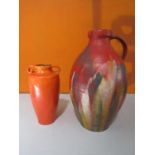 Brannam of Barnstaple pottery - Studio pottery water carrying jug, with red lava type glaze with