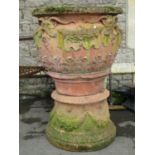 A large weathered contemporary composition stone garden urn with flared rim, repeating acanthus,