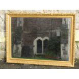 A gilt framed wall mirror of rectangular form with beaded slip and moulded foliate surround, 96cm