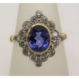 18ct tanzanite and diamond cluster ring of lozenge form, size N, 4.8g