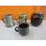 Harry Davis & May for Crowan Pottery two celadon glazed pint tankards together with a further