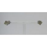 Pair of 18ct white gold stud earrings of square form, each set with four princess cut diamonds, 2.6g