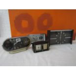 Two retro flip date clocks together with a further Bradley musical alarm clock and a further Smith's
