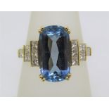 Art Deco style 18ct aquamarine ring with stepped diamond set shoulders, maker T T, size O, 6.9g