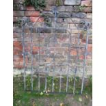 A ironwork pedestrian gate with decorative scroll detail 102cm wide (full width) x 136cm high