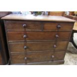 A 19th century oak chest of three long and two short drawer raised on a plinth base, 107cm wide x