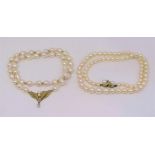 Two cultured pearl necklaces each with 14ct diamond set clasp (2)