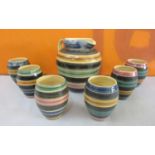Fenn studio pottery lemonade set comprising jug and six beakers all with painted banded