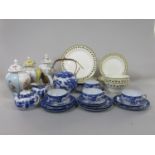 A collection of early 20th century Wedgwood creamware type wares in the Strawberry Fruit pattern