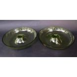 A pair of olive green mid 20th century centre pieces by Flygsfors of Sweden, each 23 cm diameter (2)